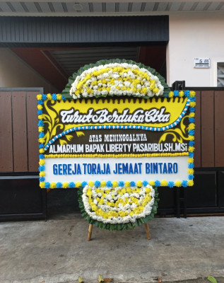 Papan Bunga Duka di Sampir